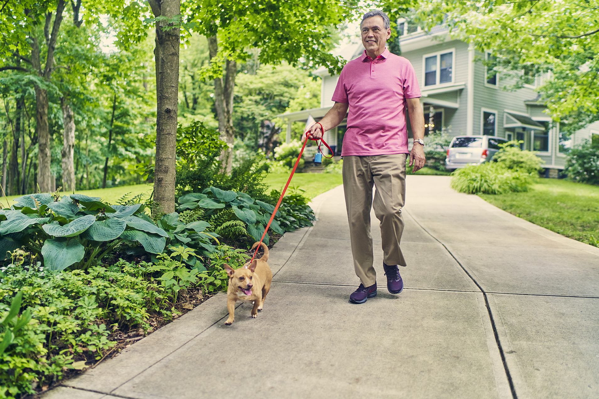 A man walking his dog