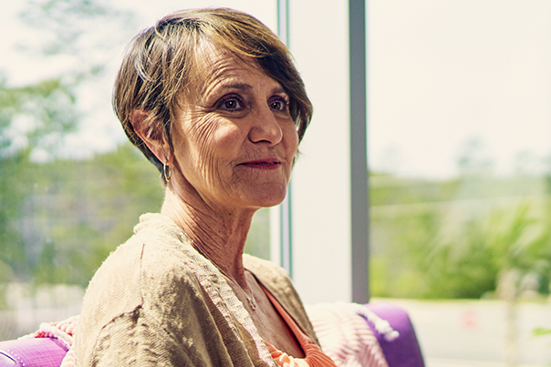 woman smiling looking away