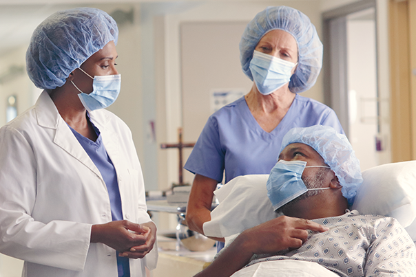 doctors with a patient in a hospital