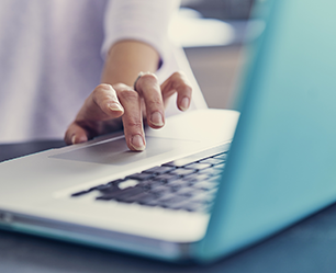 hand typing on a keyboard